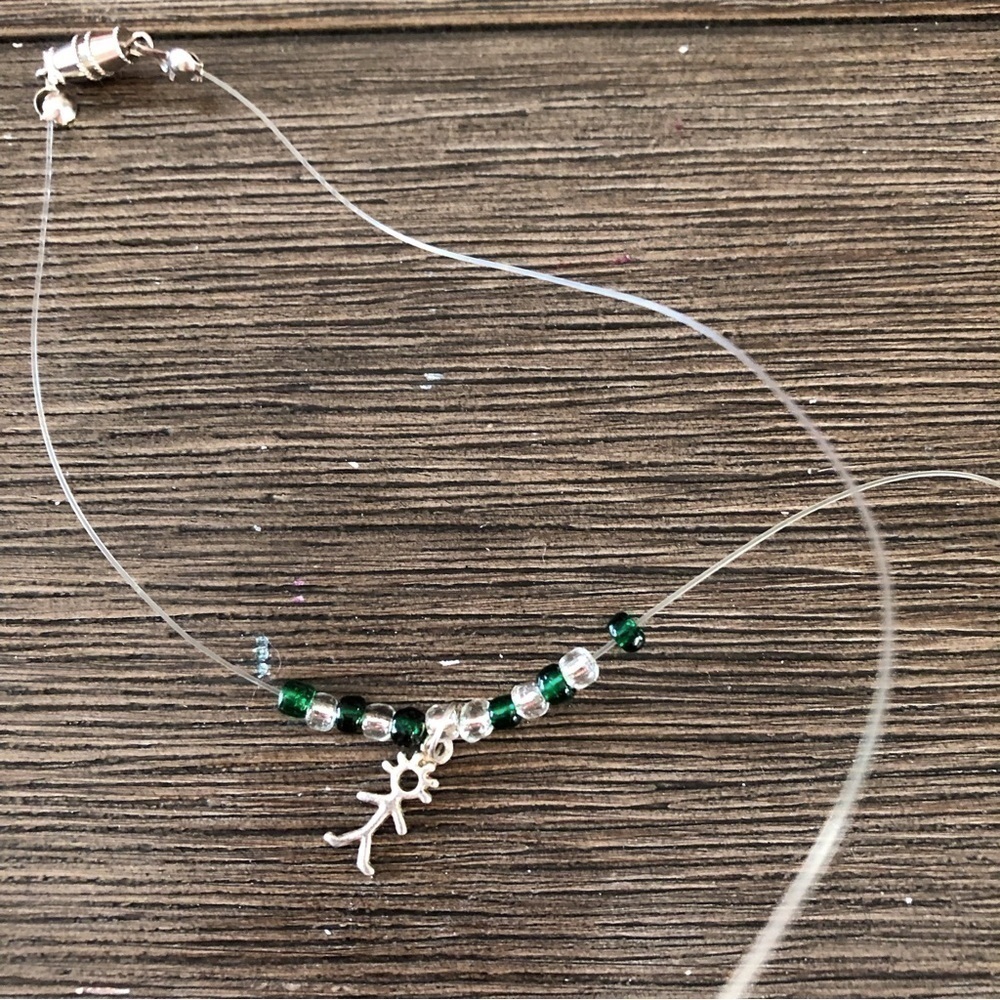 Green and clear beaded floating necklace